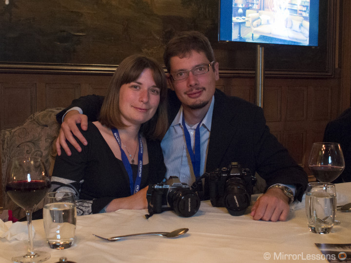 Mat and I enjoying our dinner. E-M1, 1/20, f/ 3.5, ISO 6400